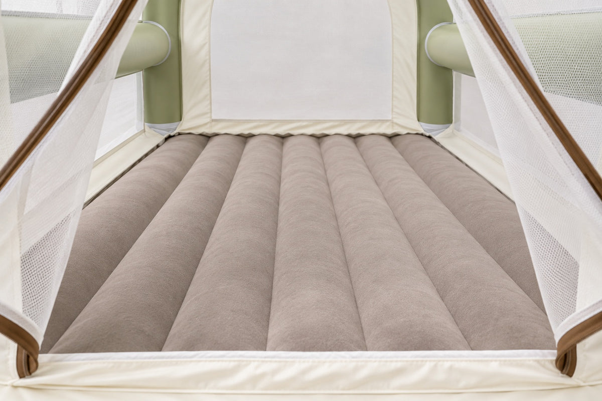 The taupe flocked floor of the Arc with its soft channels