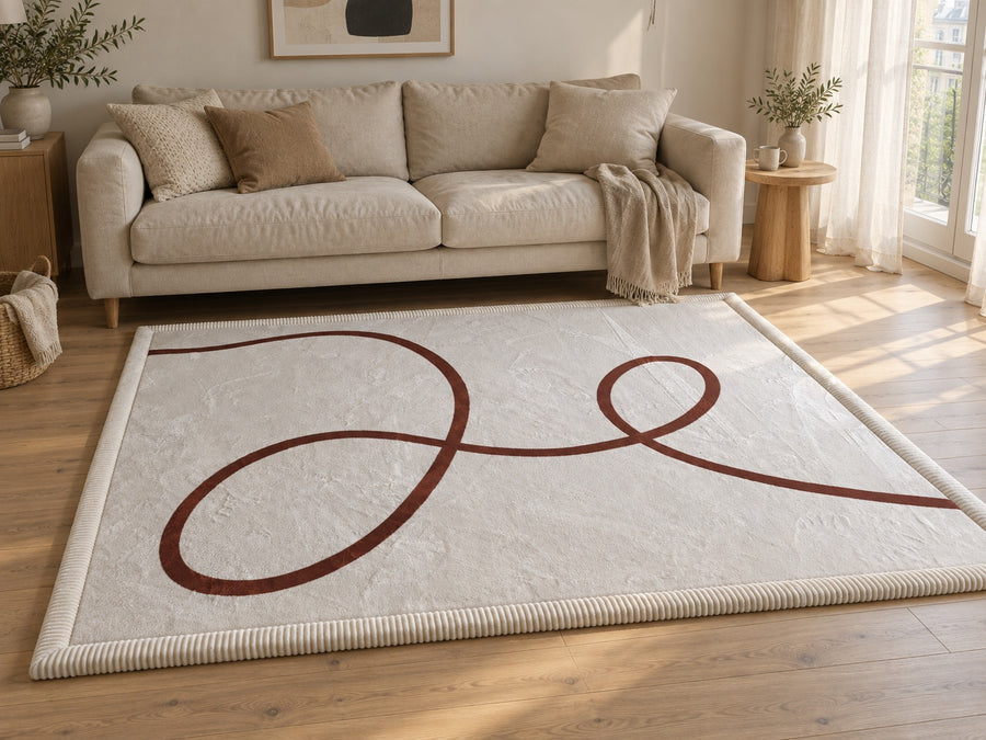 Tumble No. 01 Scribble baby play mat in a sunlit living room in front of a linen sofa